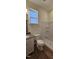 Clean bathroom with a stand-up shower and gray vanity at 829 Emmer St, Rolesville, NC 27571