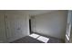 Simple bedroom with double door closet and window at 829 Emmer St, Rolesville, NC 27571