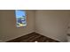 Cozy bedroom with hardwood floors and a view of the neighborhood at 829 Emmer St, Rolesville, NC 27571