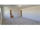 Primary bedroom with carpet and ensuite bathroom access at 829 Emmer St, Rolesville, NC 27571