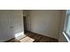 Simple bedroom with hardwood floors and double door closet at 829 Emmer St, Rolesville, NC 27571