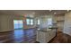 Open concept dining area with hardwood floors and access to the back deck at 829 Emmer St, Rolesville, NC 27571