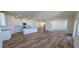 Open concept dining area with hardwood floors and access to the back deck at 829 Emmer St, Rolesville, NC 27571