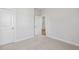 Spacious bedroom with neutral carpeting and ample closet space at 69 Browning Mill Dr, Wendell, NC 27591