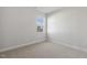 Simple bedroom with carpet and window at 69 Browning Mill Dr, Wendell, NC 27591