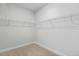 Walk-in closet with wire shelving, maximizing storage and organization space at 69 Browning Mill Dr, Wendell, NC 27591
