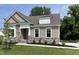 Charming single-Gathering home with stone accents and well-maintained landscaping at 69 Browning Mill Dr, Wendell, NC 27591