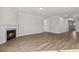The living room has wood floors and a fireplace at 69 Browning Mill Dr, Wendell, NC 27591