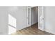 Bright office with laminate wood floors and modern French doors at 69 Browning Mill Dr, Wendell, NC 27591