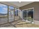 A screened porch attached to a new construction home at 69 Browning Mill Dr, Wendell, NC 27591