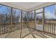 An empty screened-in porch with outdoor access at 69 Browning Mill Dr, Wendell, NC 27591