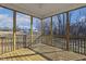 A screened porch offers outdoor living space with views at 69 Browning Mill Dr, Wendell, NC 27591