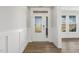 Entryway featuring decorative paneling, and natural light from a sidelight window at 55 Browning Mill Dr, Wendell, NC 27591