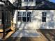 Exterior showcasing a screened porch, white siding, and a concrete slab at 148 Hook Dr # 7, Fuquay Varina, NC 27526