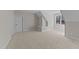 Bedroom showcasing a large window, neutral carpet, and trim at 148 Hook Dr # 7, Fuquay Varina, NC 27526