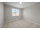 Simple, yet comfortable bedroom featuring carpet floors, a window and neutral walls at 148 Hook Dr # 7, Fuquay Varina, NC 27526