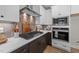 Stylish kitchen with stainless steel appliances, light countertops and a gas cooktop and wall microwave at 148 Hook Dr # 7, Fuquay Varina, NC 27526