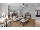 Spacious open-concept living room with hardwood floors, modern decor, and natural light at 148 Hook Dr # 7, Fuquay Varina, NC 27526