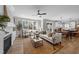 Bright and airy living room with fireplace, large windows, and an open floor plan at 148 Hook Dr # 7, Fuquay Varina, NC 27526