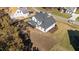Aerial view of a two-story home showing the screened porch and a spacious yard at 148 Hook Dr # 7, Fuquay Varina, NC 27526