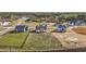 Aerial view of a vacant lot with houses surrounding it in a neighborhood at 65 Diamond Creek Dr, Zebulon, NC 27597