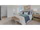 Cozy main bedroom showcases a tufted headboard, and bench seating at 65 Diamond Creek Dr, Zebulon, NC 27597