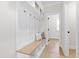 Entryway with coat hooks, a bench, and a shelf for storage at 108 Nakoma Dr, Louisburg, NC 27549