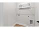 A utility room featuring connections for a washer and a dryer at 108 Nakoma Dr, Louisburg, NC 27549