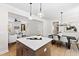 Open-concept floorplan seamlessly connects the living room, kitchen, and dining areas, creating a spacious layout at 108 Nakoma Dr, Louisburg, NC 27549