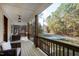 Spacious front porch offering outdoor seating and scenic neighborhood views at 158 Nakoma Dr, Louisburg, NC 27549