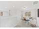 Bright living room area featuring neutral colors and lots of natural light at 158 Nakoma Dr, Louisburg, NC 27549