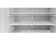 White painted pantry with multiple shelves for organized storage at 158 Nakoma Dr, Louisburg, NC 27549