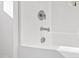 A close up of the modern fixtures in a bright white shower at 158 Nakoma Dr, Louisburg, NC 27549