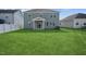 Enjoy this large backyard space ready for entertaining and relaxing at 305 Chestnut Oak Ln, Lillington, NC 27546