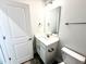 Bathroom featuring vanity, toilet, and hardware at 114 Southern Estates Dr, Sanford, NC 27330