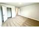 Bedroom with neutral walls and plush carpet, and an open closet with shelving at 114 Southern Estates Dr, Sanford, NC 27330