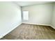 Cozy bedroom with plush carpet and natural light from window at 114 Southern Estates Dr, Sanford, NC 27330