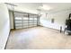 Spacious two-car garage with automatic door opener and clean concrete flooring at 114 Southern Estates Dr, Sanford, NC 27330