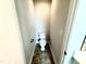 Small toilet room features neutral paint, base molding and tile flooring at 114 Southern Estates Dr, Sanford, NC 27330