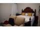 Bedroom with a large bed and a couch at 1850 Gillburg Road, Henderson, NC 27537