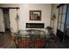 Elegant dining room with glass table and fireplace at 1850 Gillburg Road, Henderson, NC 27537