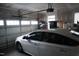 Garage with car and automatic door opener at 1850 Gillburg Road, Henderson, NC 27537