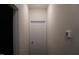 Hallway with white door and thermostat at 1850 Gillburg Road, Henderson, NC 27537