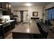 Modern kitchen with island and stainless steel appliances at 1850 Gillburg Road, Henderson, NC 27537