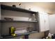 Laundry room with shelves and cabinets at 1850 Gillburg Road, Henderson, NC 27537