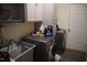 Laundry room with washer, dryer, and cabinets at 1850 Gillburg Road, Henderson, NC 27537