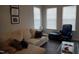 Relaxing living room with sectional sofa and large windows at 1850 Gillburg Road, Henderson, NC 27537