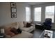 Spacious living area with sectional sofa and large windows at 1850 Gillburg Road, Henderson, NC 27537