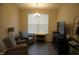 Cozy living room with two armchairs and a TV at 1850 Gillburg Road, Henderson, NC 27537
