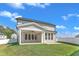 Backyard with a covered patio, ceiling fan, and ample natural light, surrounded by a well-manicured lawn at 9113 Dupree Meadow Dr # 41, Angier, NC 27501